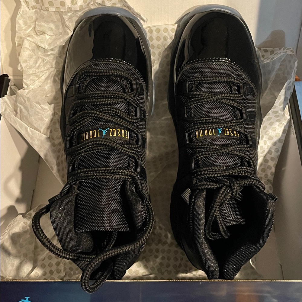 Kids Air Jordan 11 Retro Gamma
Black and Blue High-Top Sneakers - Picture 2 of 7
